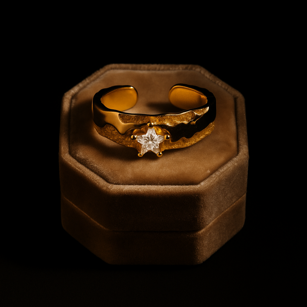 Gold ring with a diamond on a brown velvet cushion against a black background