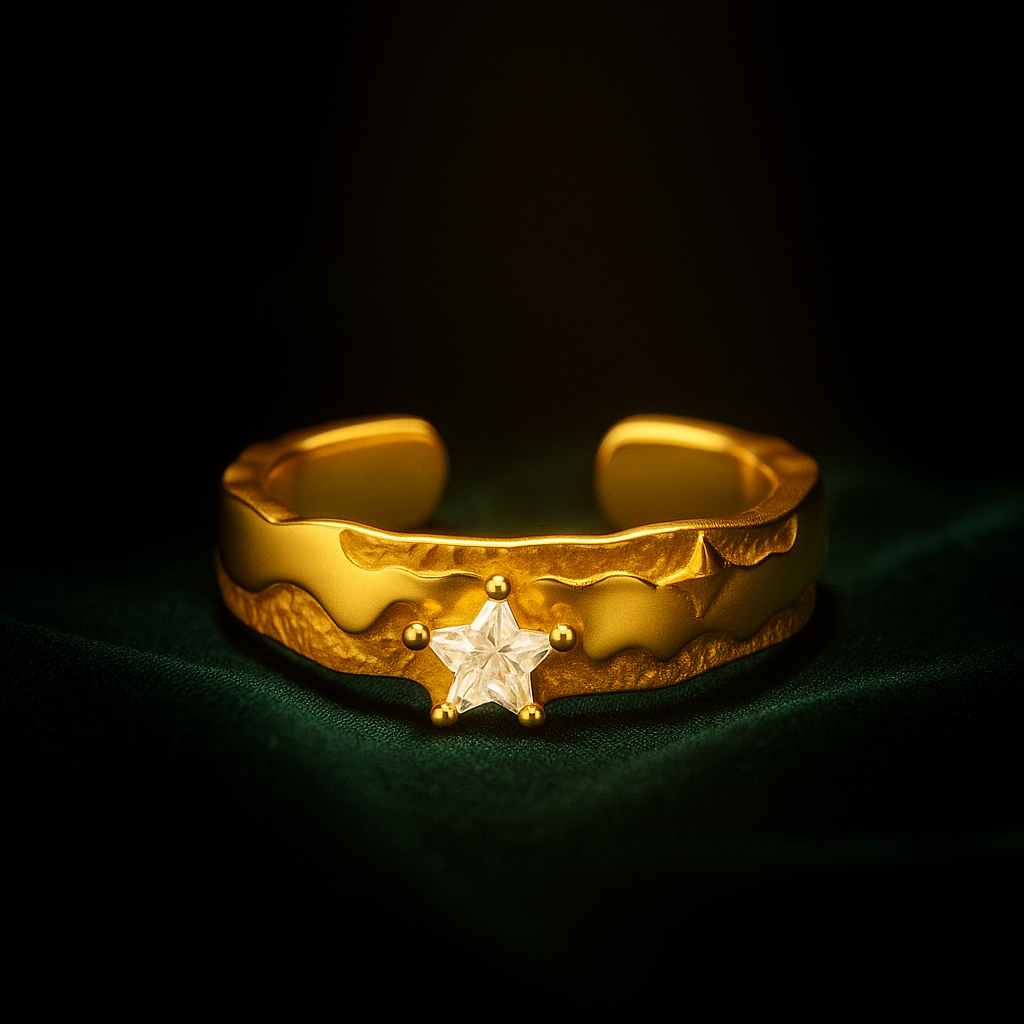 Gold bracelet with a star charm on a dark background