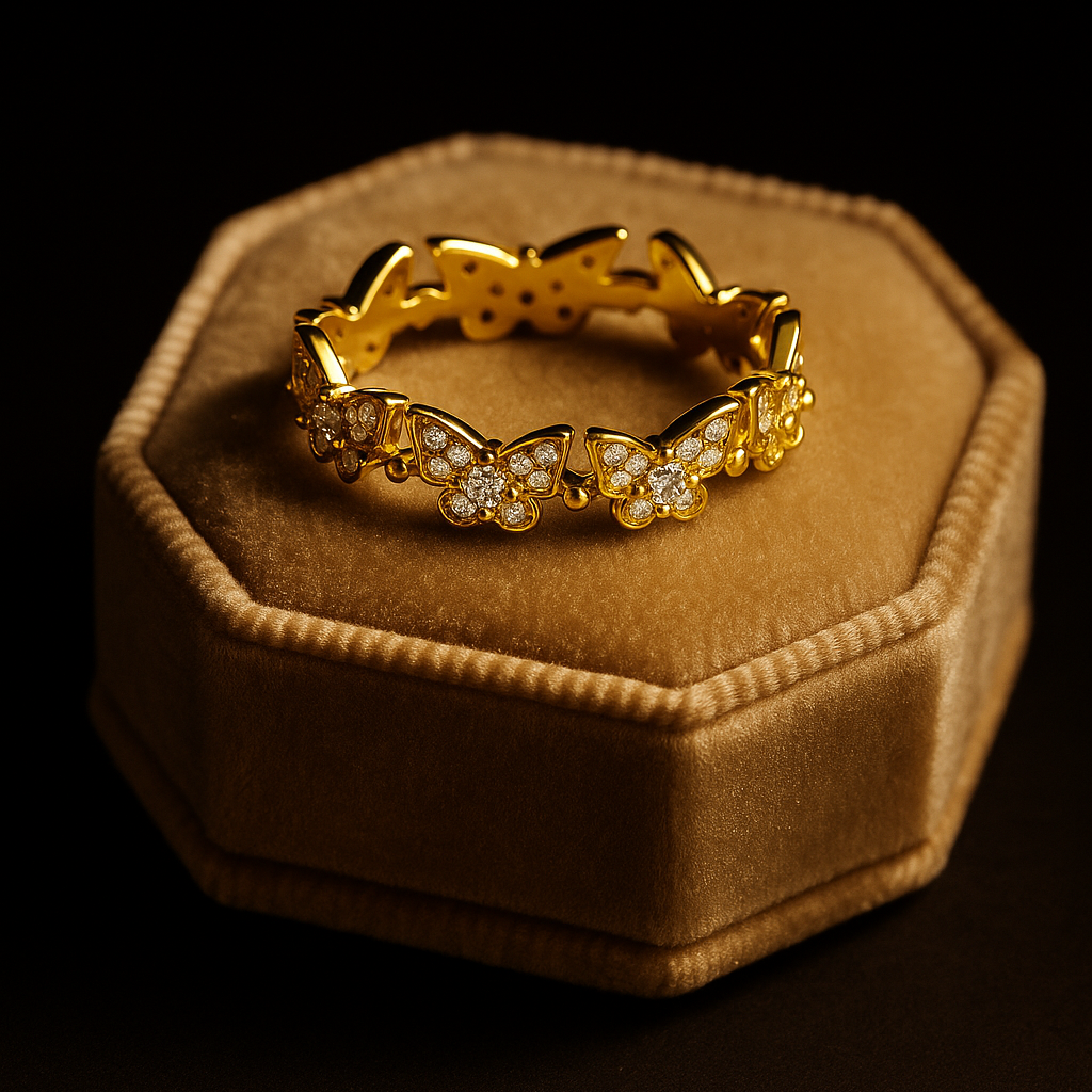 Gold ring with diamond accents on a brown cushion against a black background