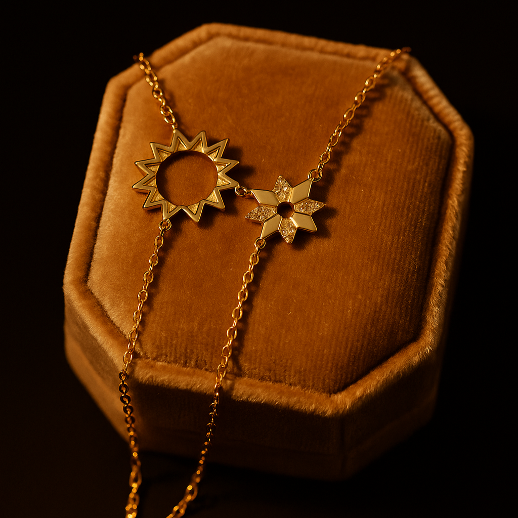 Gold necklace with sunflower pendants on a brown velvet cushion against a black background