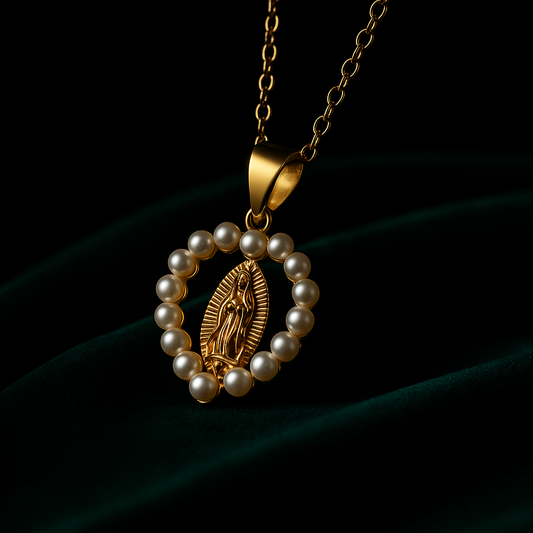 Gold necklace with a pendant featuring a religious figure and pearls on a dark background
