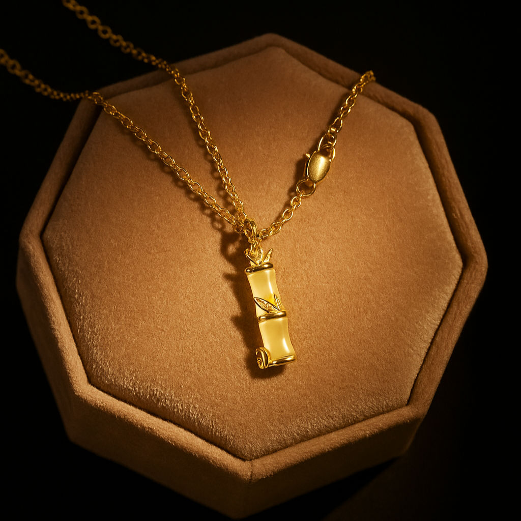 Gold necklace with a pendant on a brown hexagonal stand against a black background