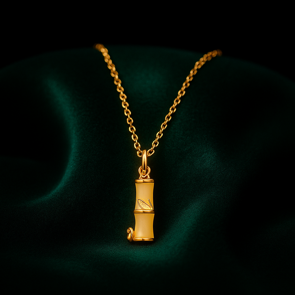 Gold necklace with a pendant on a dark background