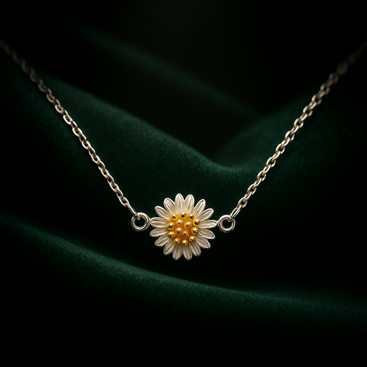 Necklace with a sunflower pendant on a dark green fabric background